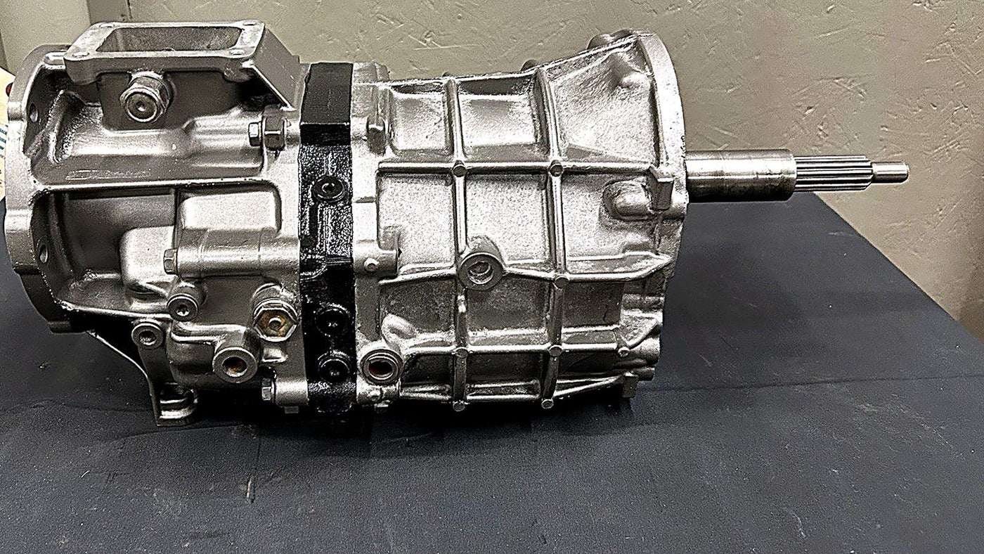 AX5 transmission guide image showcasing a detailed side view of an AX5 transmission.