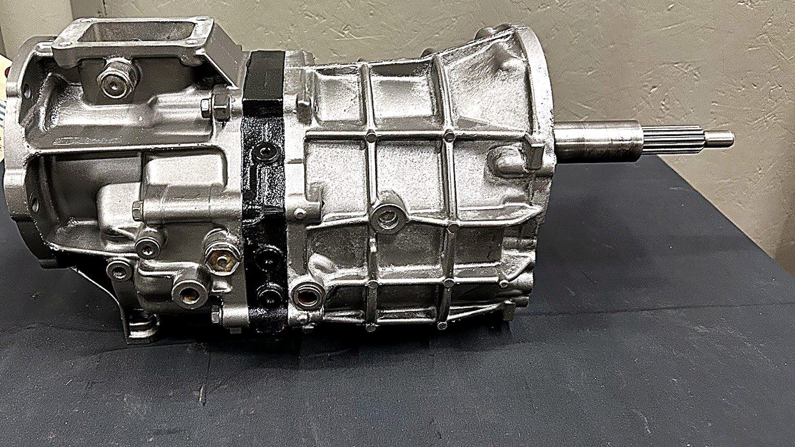 AX5 transmission guide image showcasing a detailed side view of an AX5 transmission.
