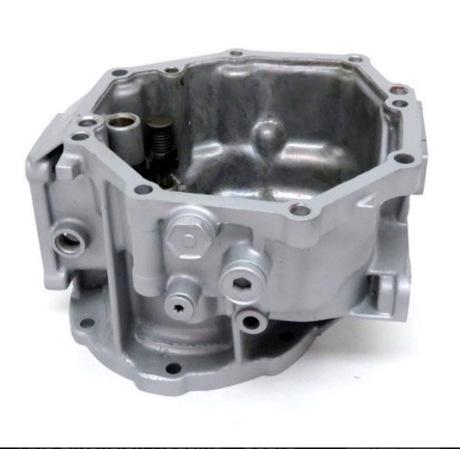 AX5 TAILHOUSING DAKOTA used transmission component, showcasing an aluminum housing with ports and fasteners.