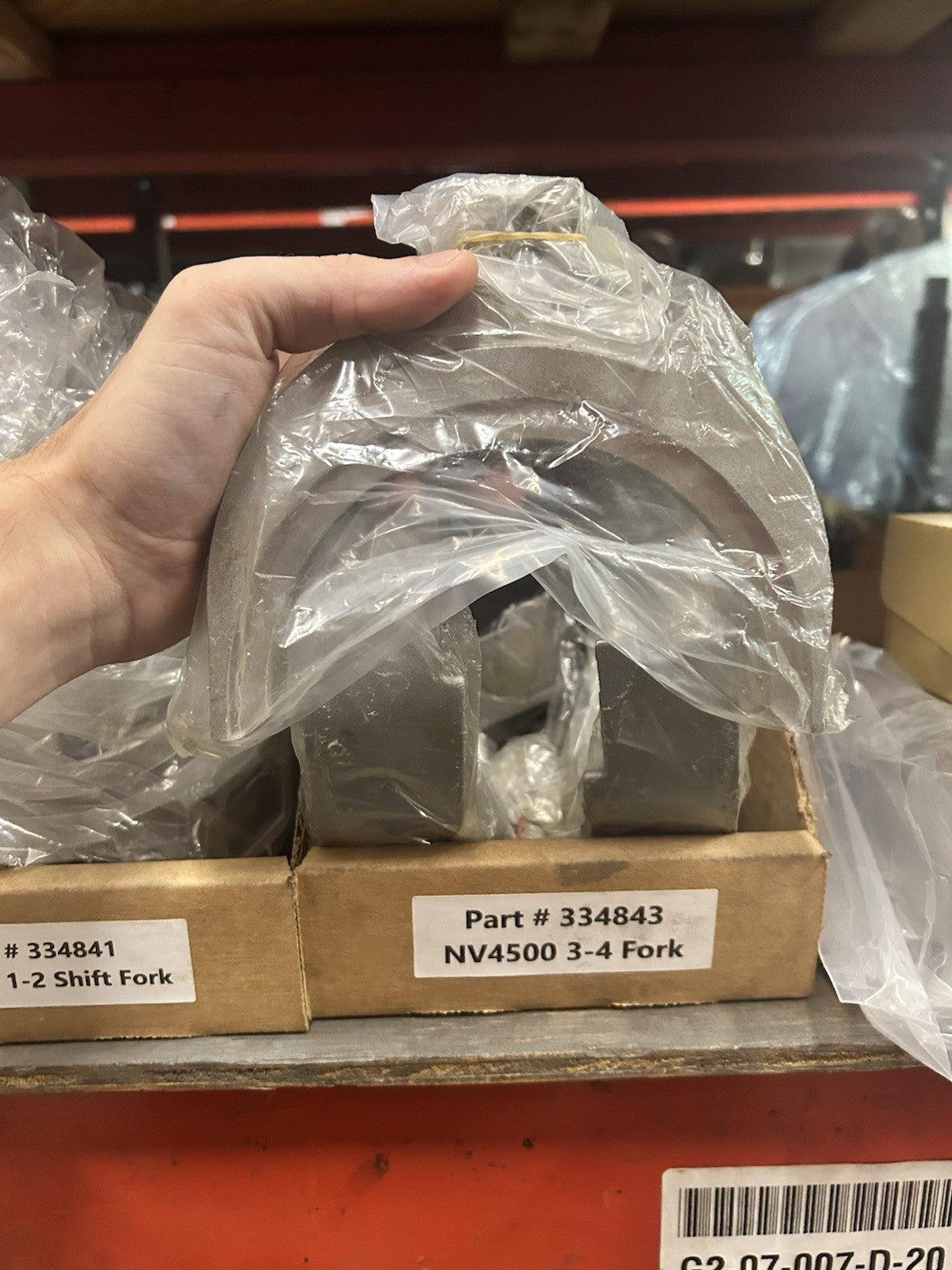 NV4500 3-4 Fork visible in plastic packaging, part number 334843.