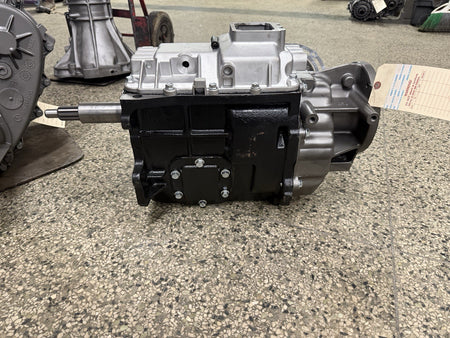 Nv4500 Dodge Manual Transmission 5.9L 8.0L 1998-2002 5 speed 4WD viewed from the side, showcasing the casing and components.