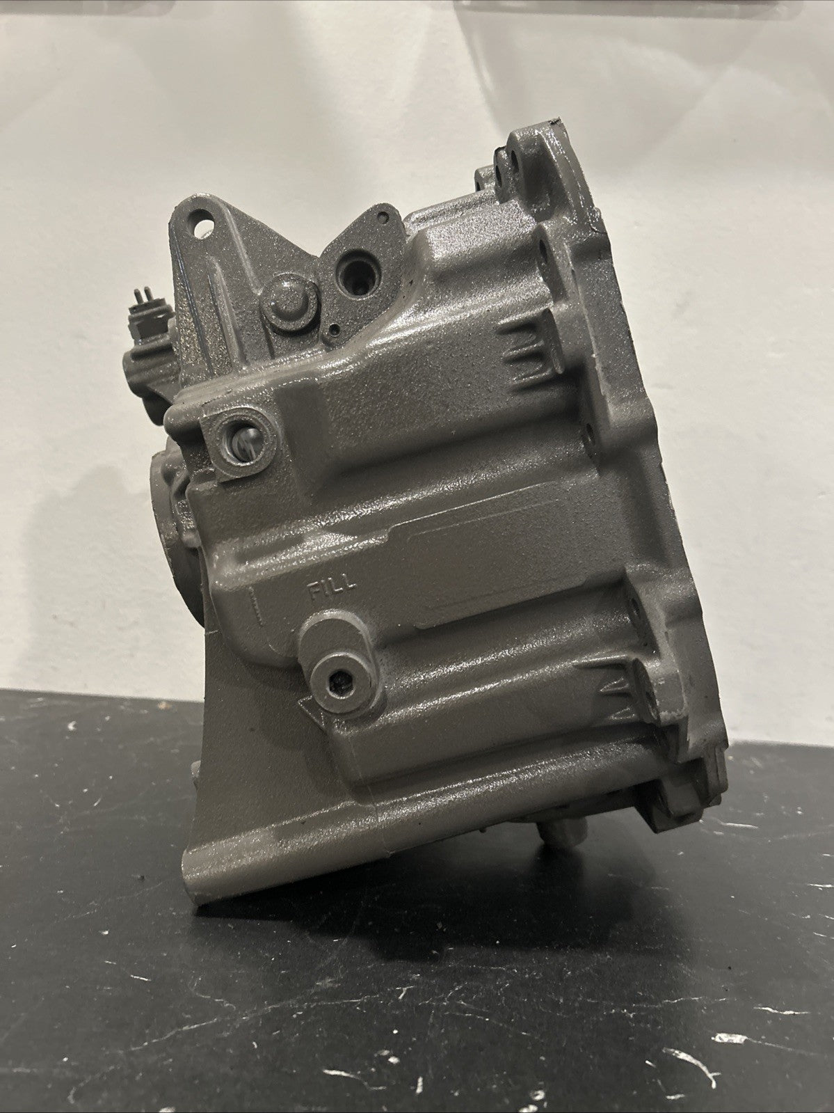 Used MT82 REAR CASE for Mustang manual transmissions, showcasing the side view of the component.