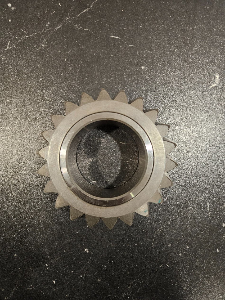 ZF S6-650 reverse idler gear 22T close-up, showcasing the gear's teeth and central opening for 7.3 diesel.