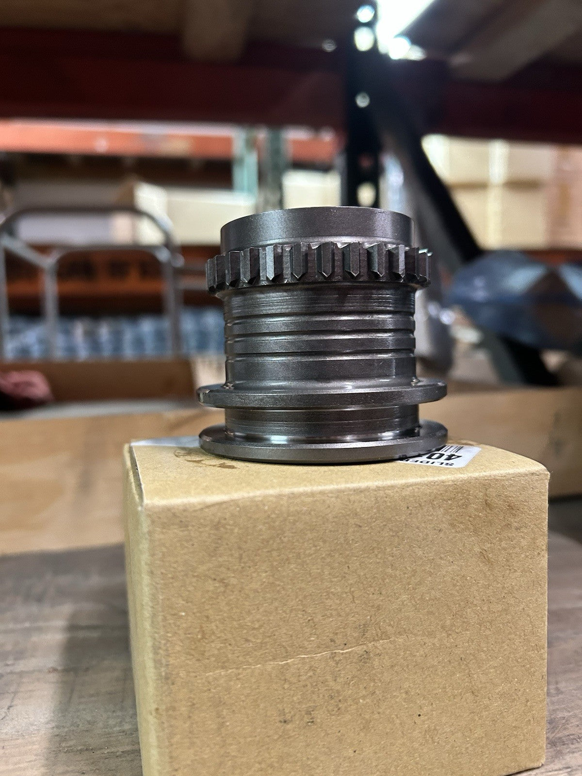NP261 Slider/Hub Range 0.318, new hub part displayed on a box with close-up view.