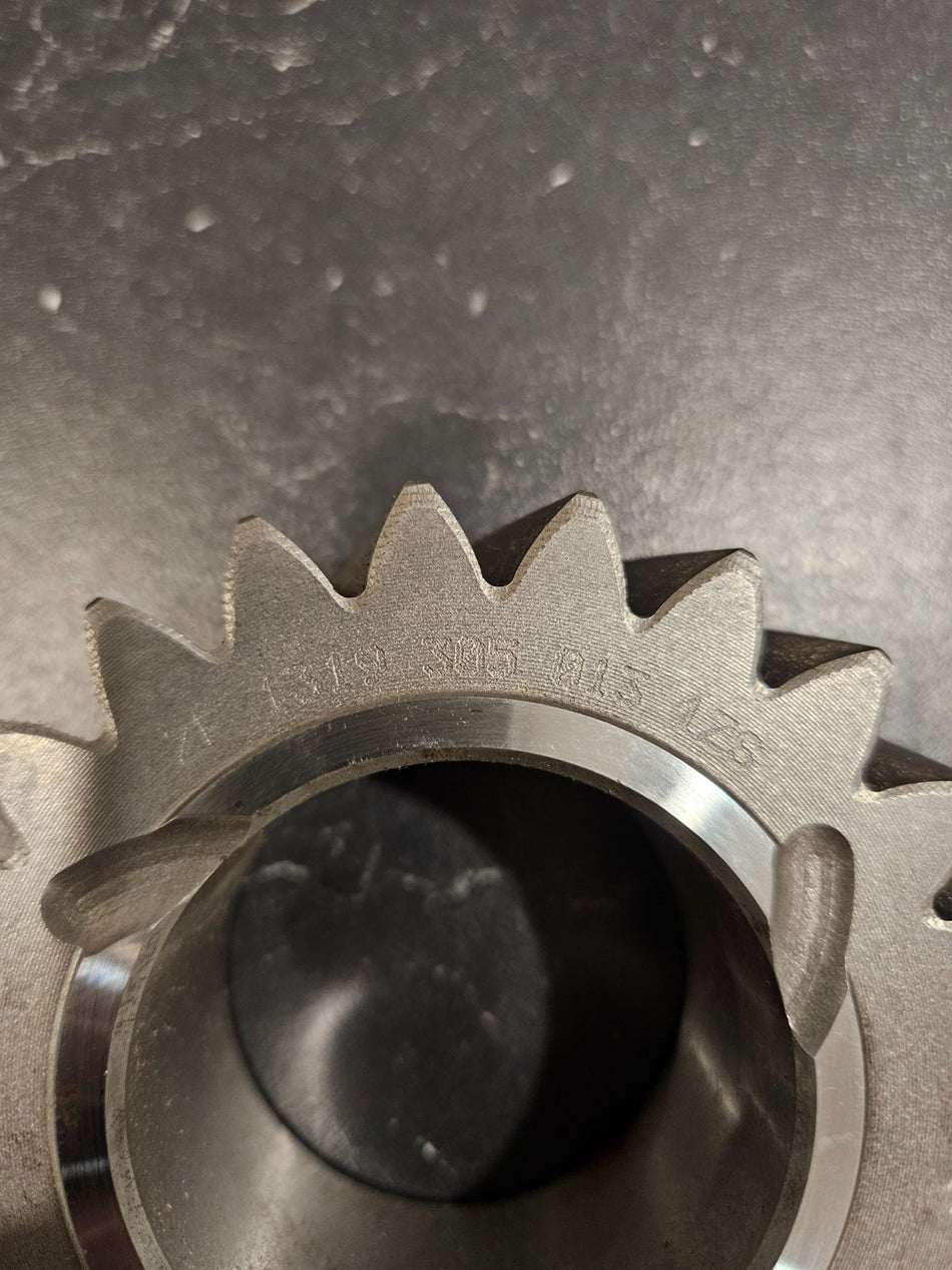 ZF S6-650 reverse idler gear 22T close-up showing teeth and shaft details.