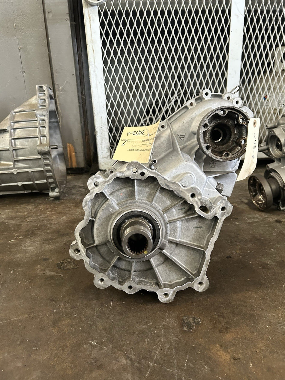 Dodge MP3023 transmission unit displayed on a workshop floor, showcasing its exterior design and components.