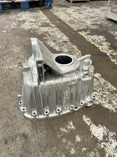 ZF 6-650 2WD Tailhousing, a new component, showcasing its metallic structure and design.