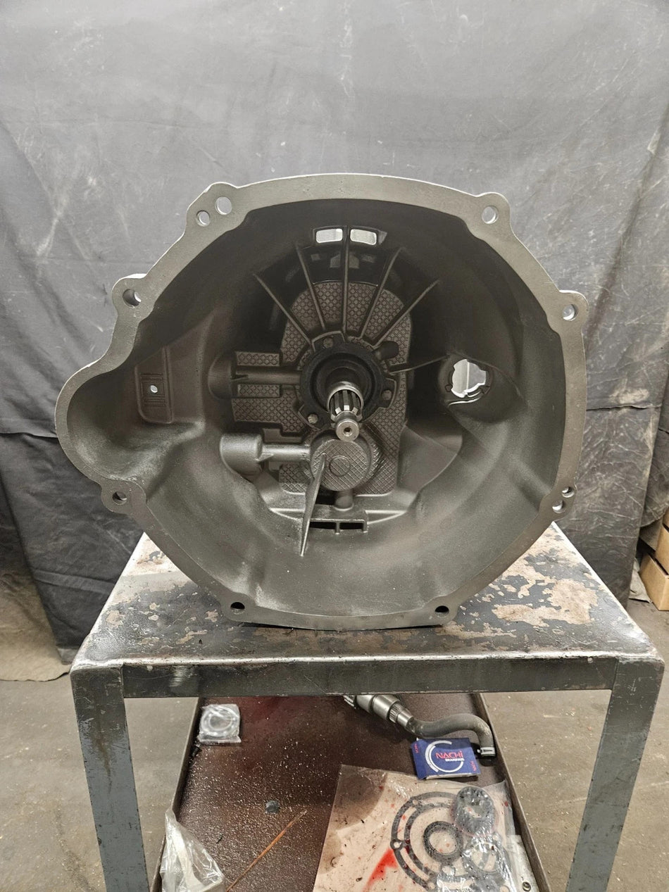 ZF 6 SPD manual transmission view showcasing interior components on a metal workbench.