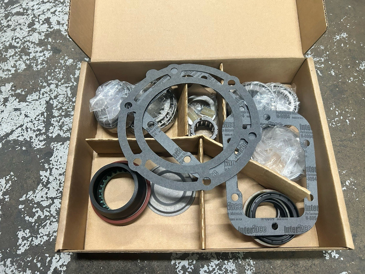Nv4500 5 Speed bearing Kit Bk308a components in a box including gaskets, bearings, and seals.