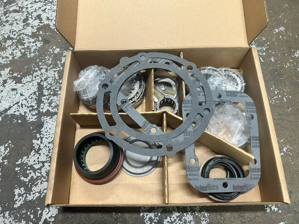 Nv4500 5 Speed bearing Kit Bk308a components in a box including gaskets, bearings, and seals.