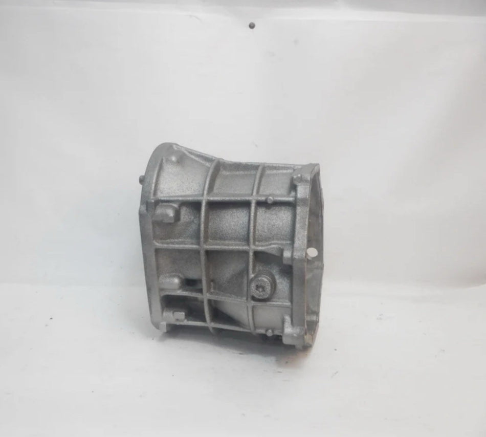 AX 5 FRONT CASE USED - silver transmission front case, showing exterior design and structure.
