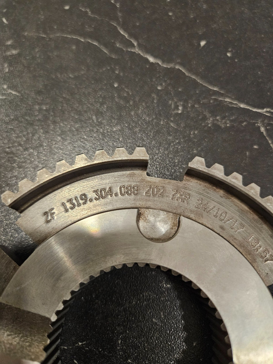 Close-up of ZF S6-650 synchro hub high torque showing detailed engravings and gear structure.