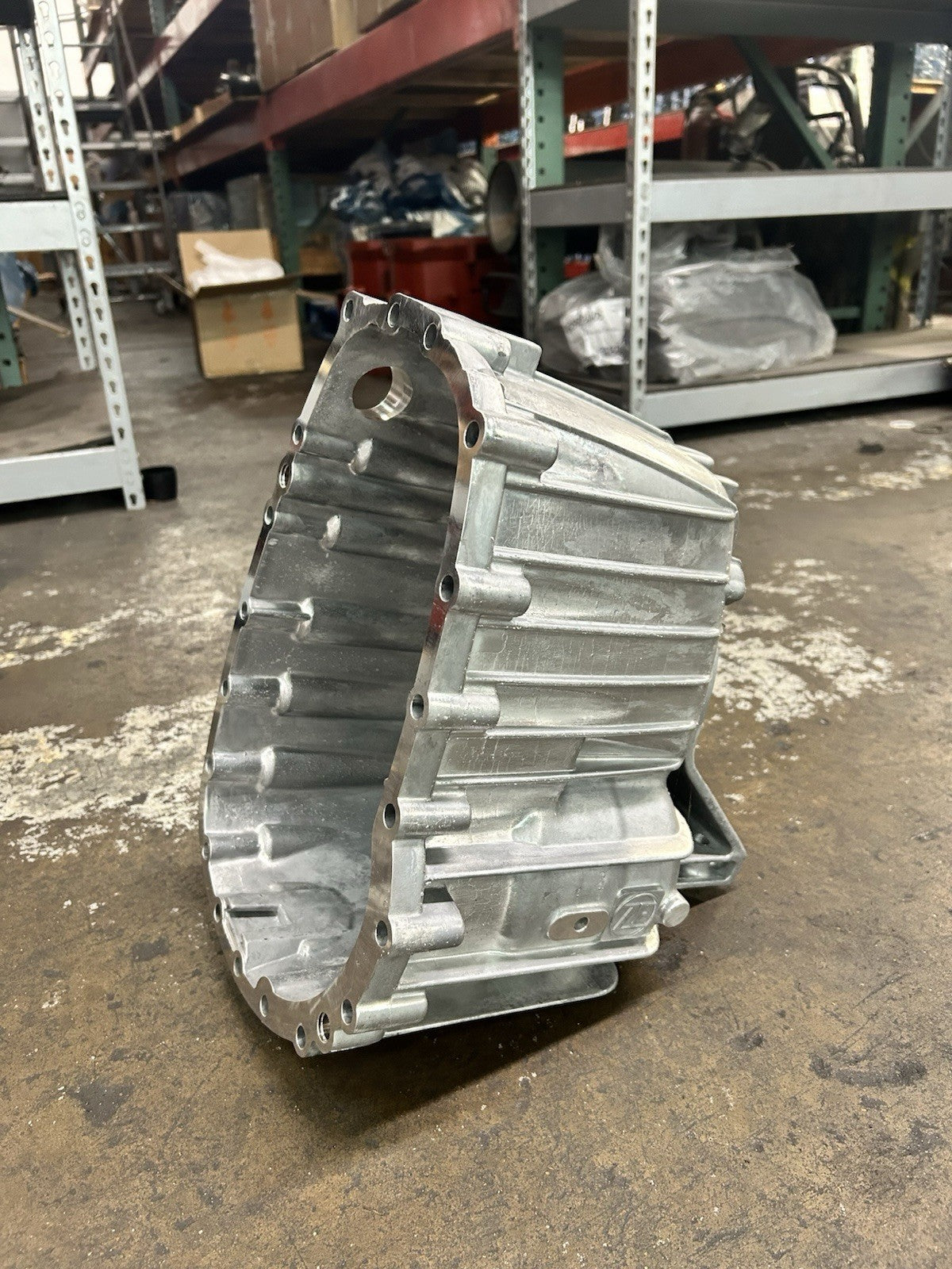 ZF 6-650 2WD Tailhousing displayed in a warehouse setting, showcasing new aluminum housing design.
