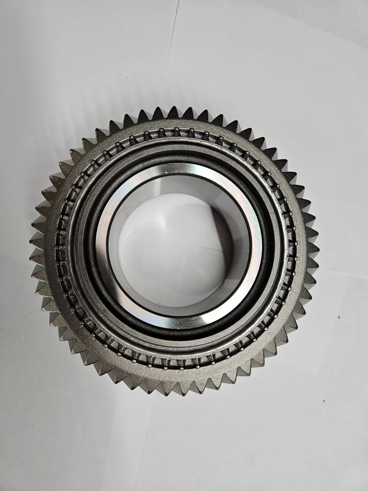 ZF S6-650 5TH GEAR 54T genuine countershaft gear view from above, showcasing teeth and inner surface.