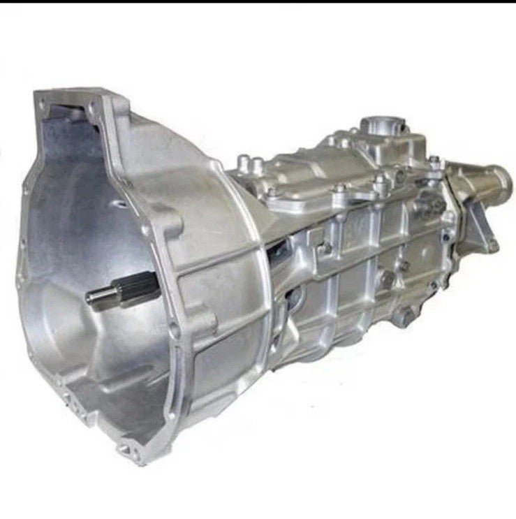M5R1 '88-'92 Ford Ranger 2wd 2.9L Manual Transmission side view showing the casing and output shaft.
