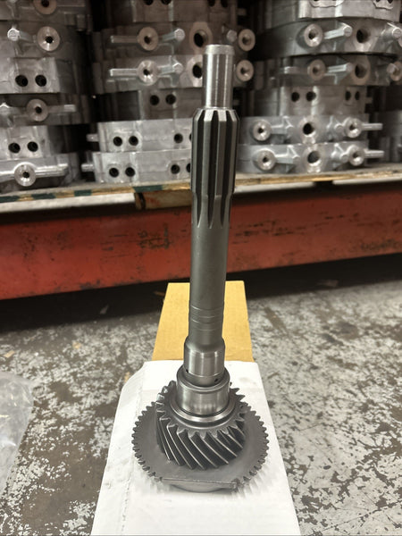 M5R2 11 3/8ths Input showcasing input shaft and gear, part of M5R2 transmission assembly.