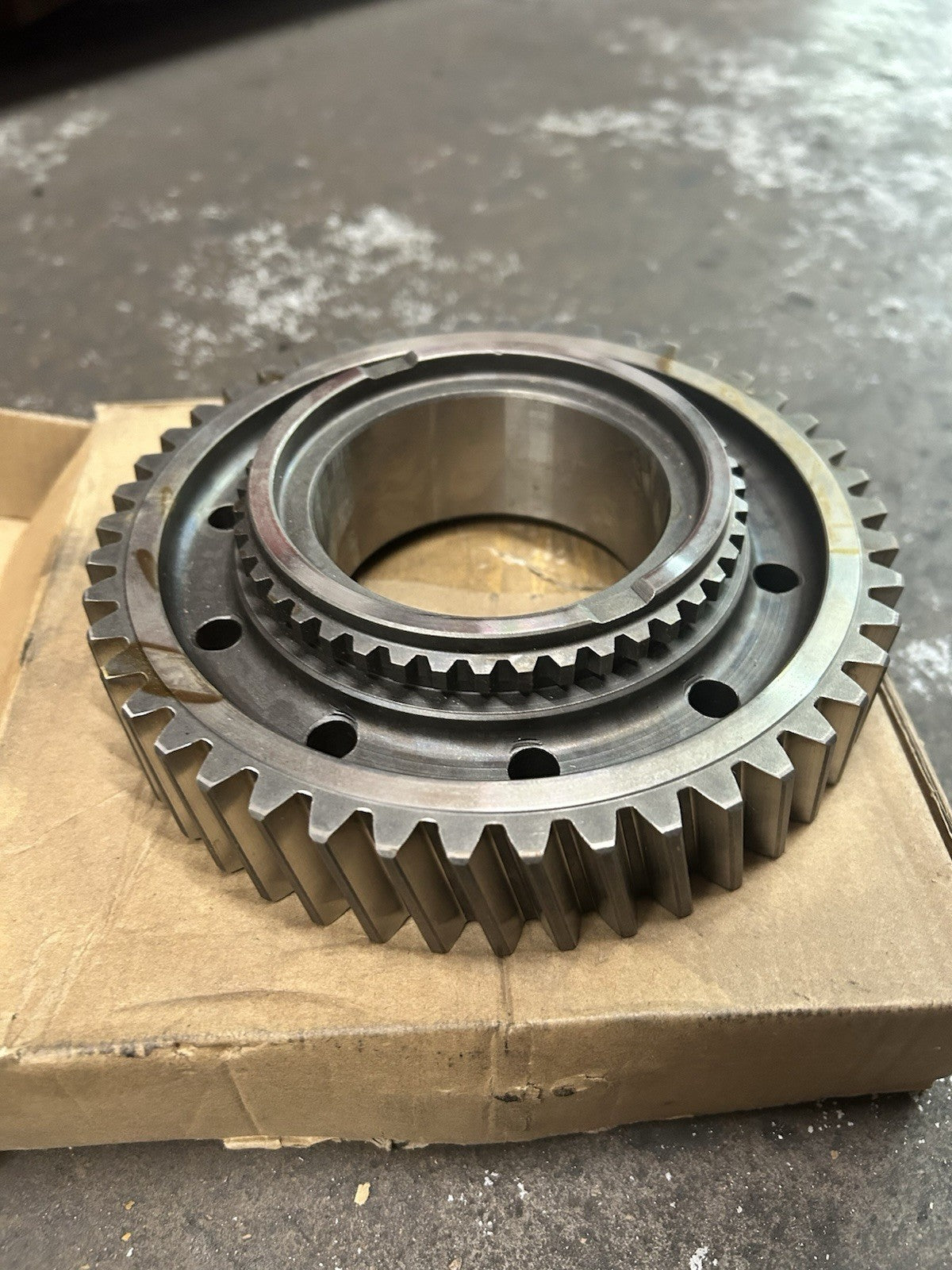 G56 1st Gear displayed in its packaging, showcasing the detailed gear teeth and inner components.