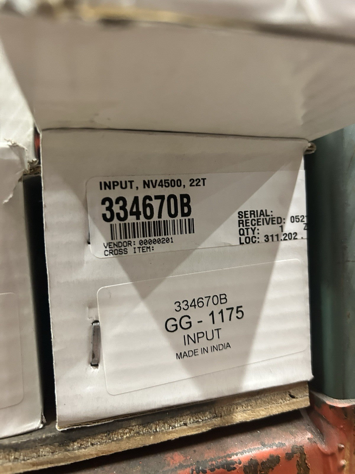 Nv4500 22T Input packaging, labeled with part number 334670B, located in an industrial setting.