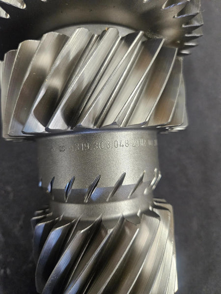 ZF S6-650 countershaft showing detailed gear teeth and manufacturer's markings on a metallic surface.