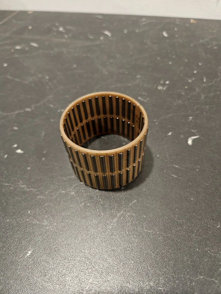 ZF S6-650 needle bearing for gears displayed on a dark surface.