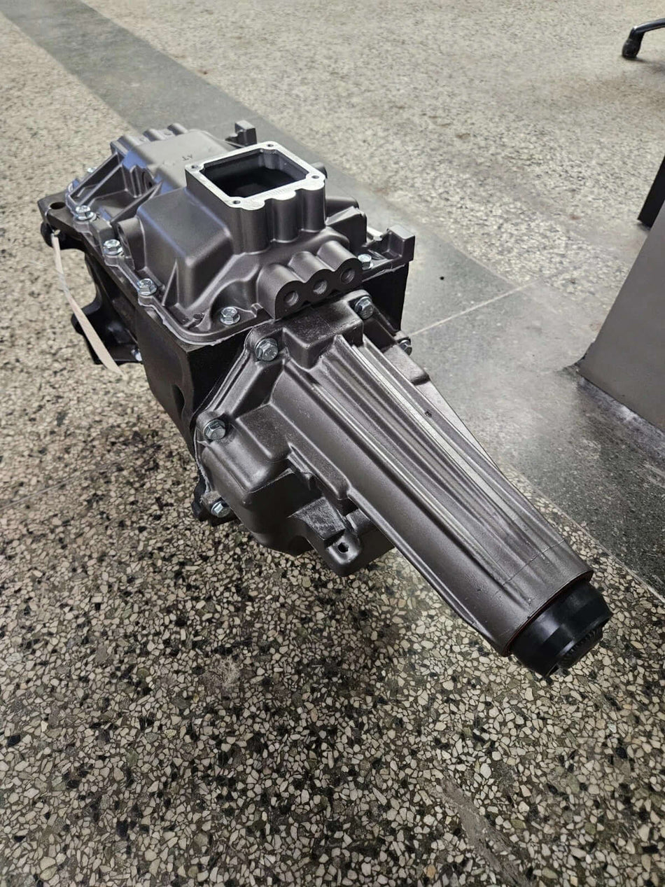 TST4500D-1 manual transmission showing cast iron case and aluminum top cover for Dodge D-Series trucks.